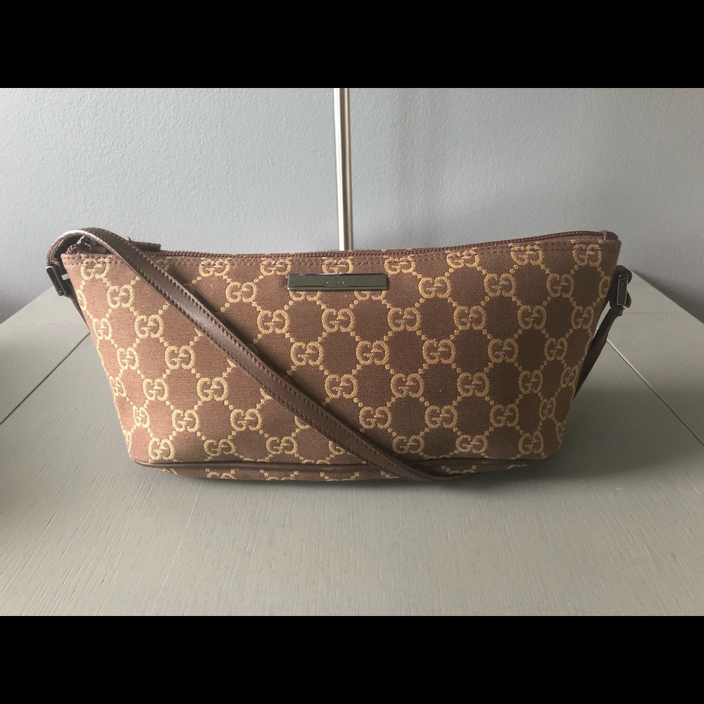 Gucci signature monogram guccissima boat pochette